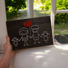 Fadenbild DIY-Set "Strichmännchen-Familie mit Ballon"